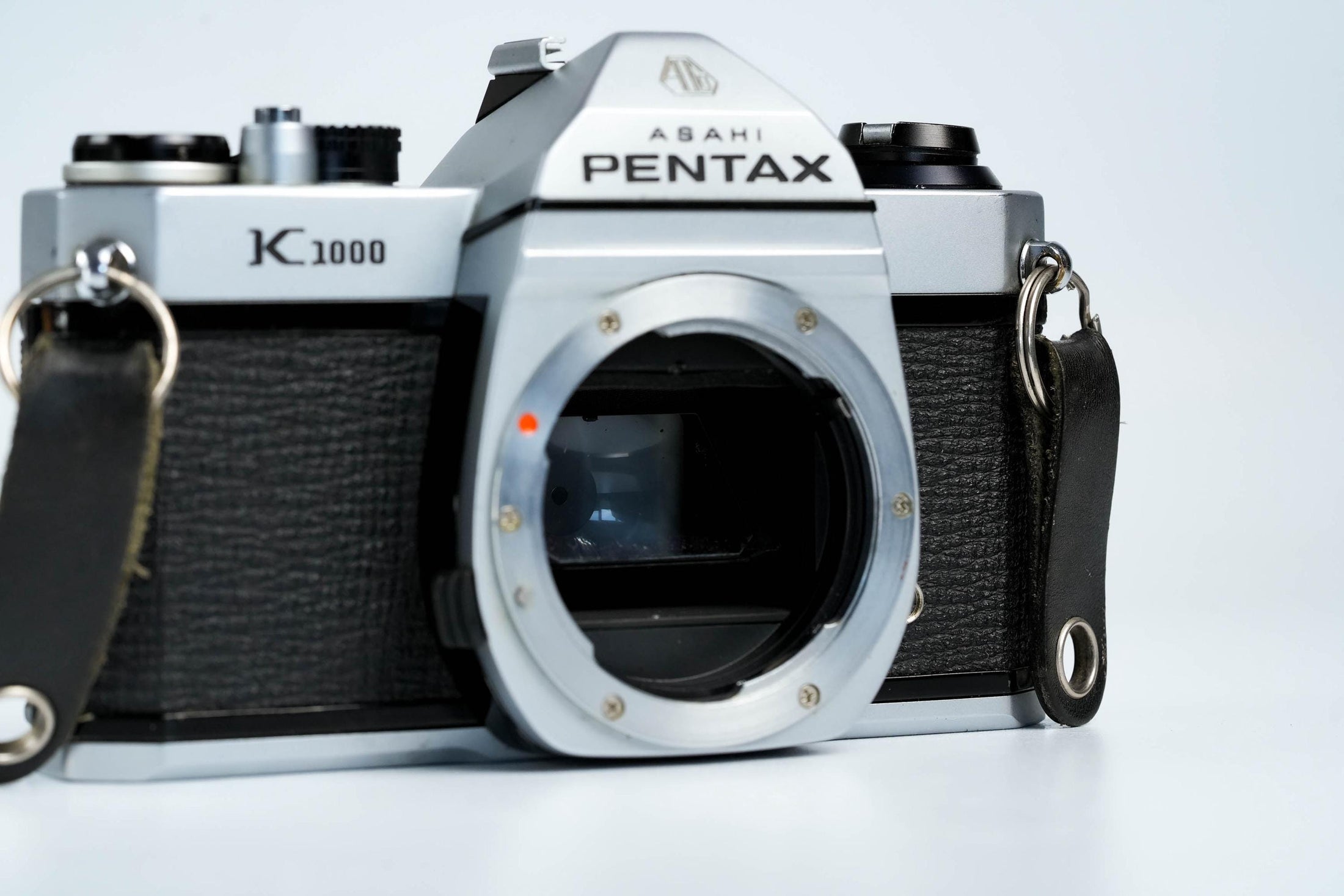 Pentax K1000 + SMC Pentax-M 50mm f/1.7 – Volledig werkend + gratis 35mm film