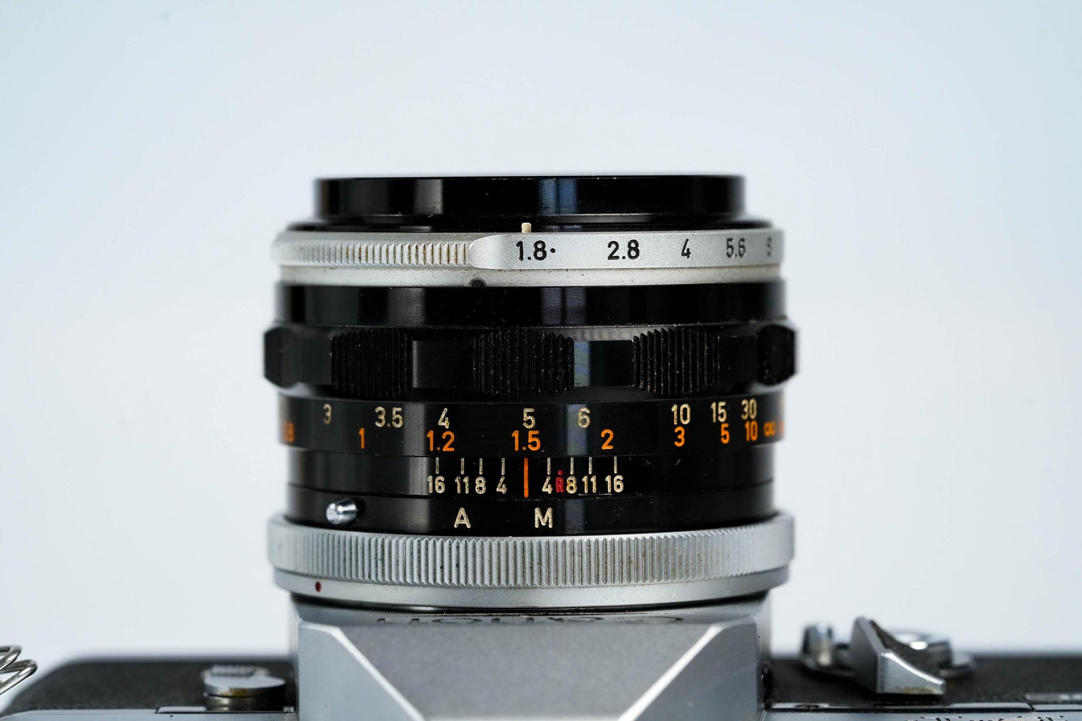 Canon FT QL + 50mm f/1.8 – Volledig werkend + gratis 35mm film