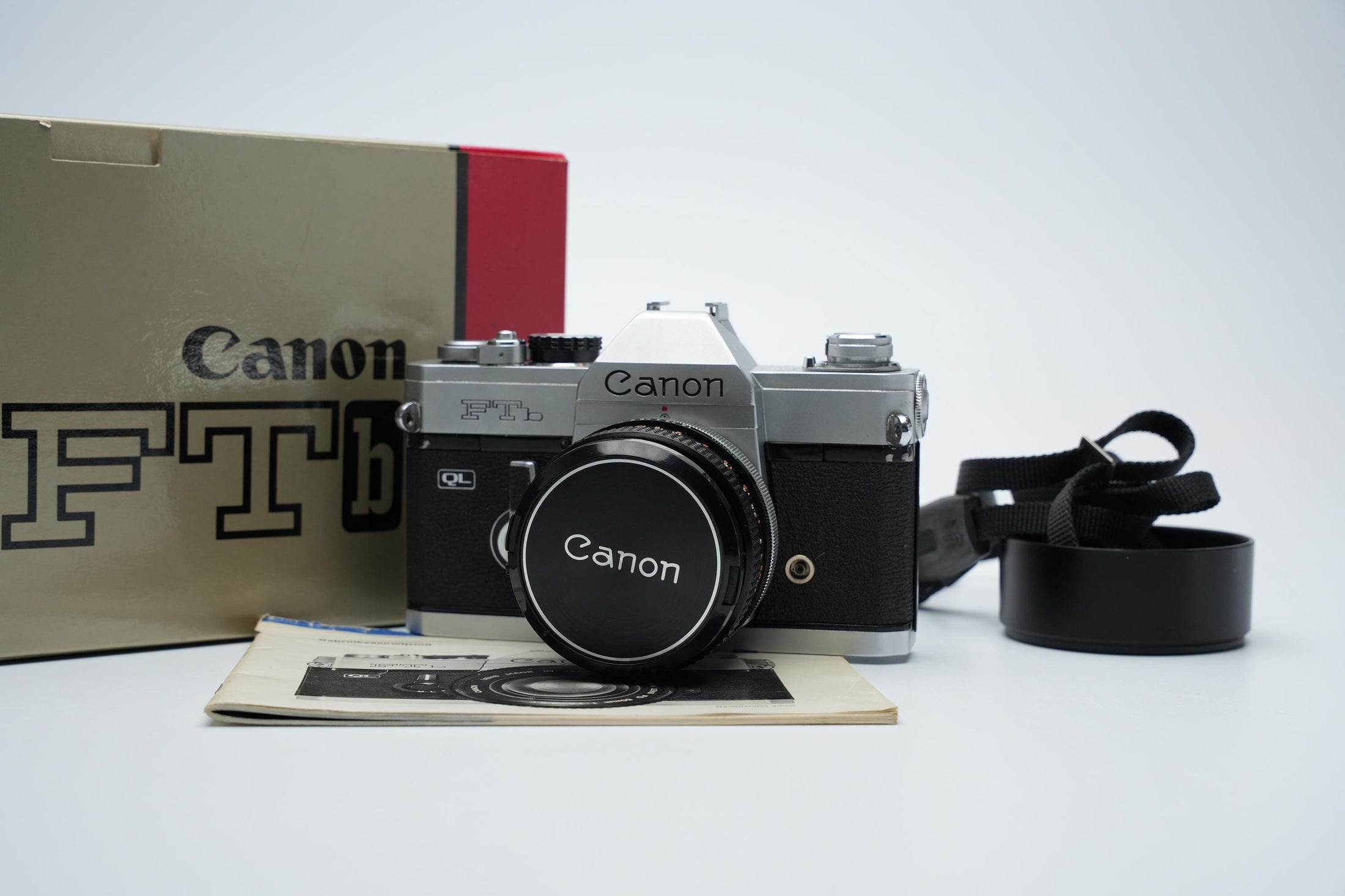 Canon FTb QL 35mm Spiegelreflexcamera met 50mm f/1.8 Lens – Compleet in Originele Doos
