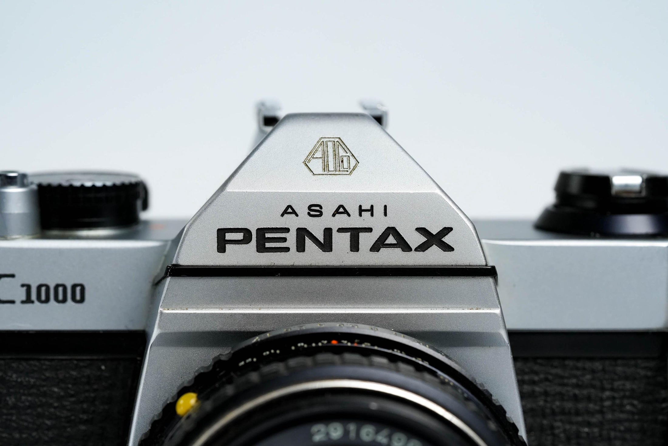 Pentax K1000 + SMC Pentax-M 50mm f/1.7 – Volledig werkend + gratis 35mm film