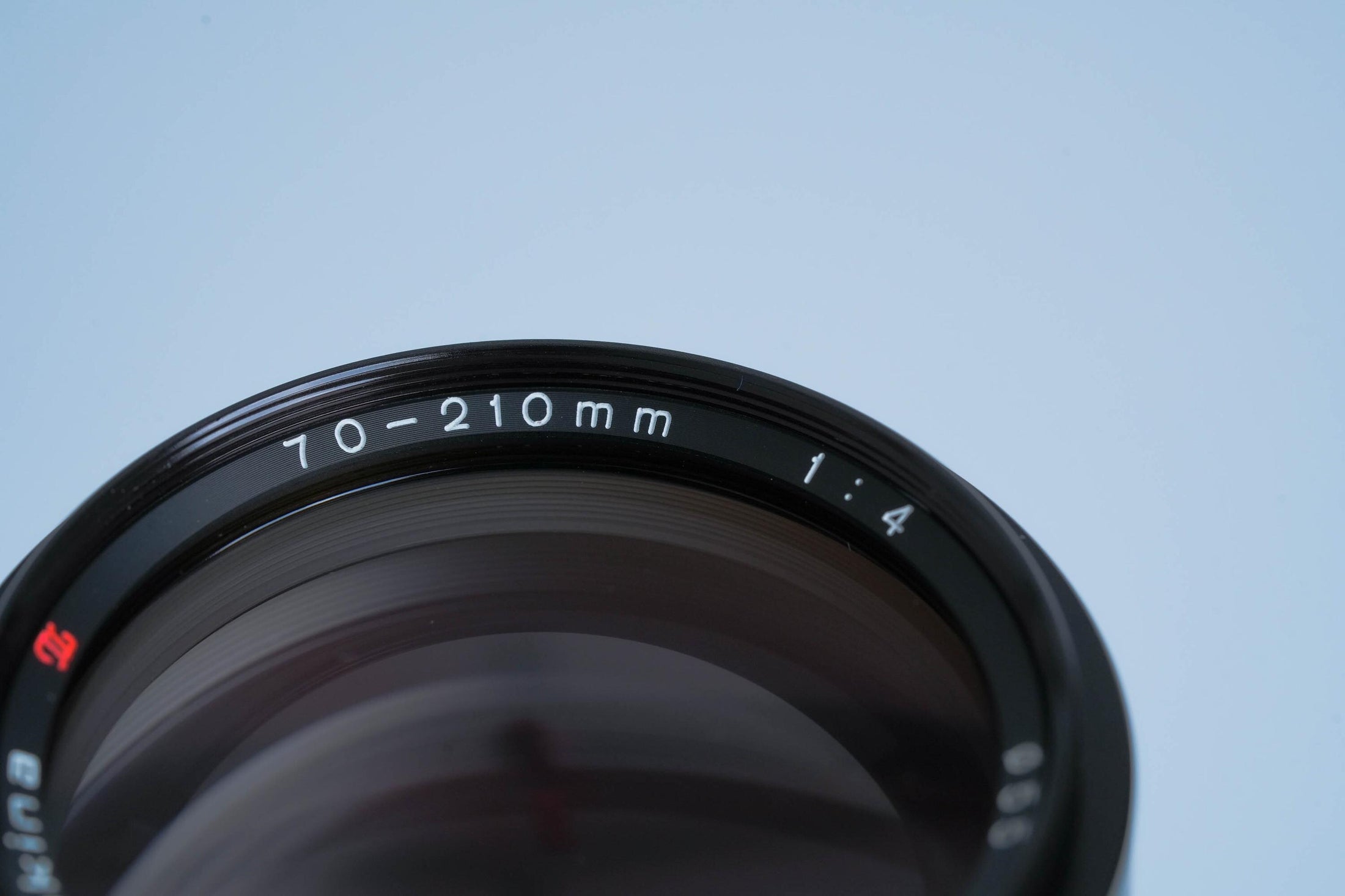Tokina 70-210mm f/4 Telezoomlens (Minolta MD) – Vintage MF Lens | Volledig Werkend
