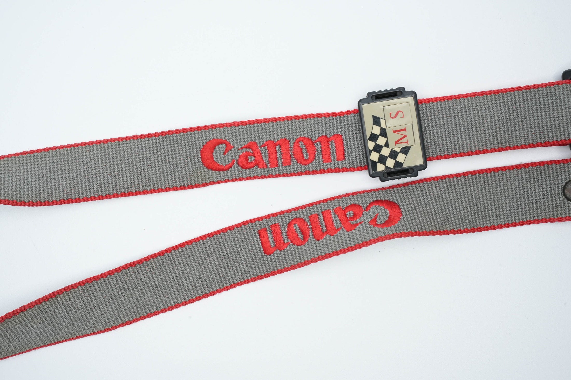 Vintage Canon cameraband grijs met rood | Vintage cameraband | Canon jaren 80