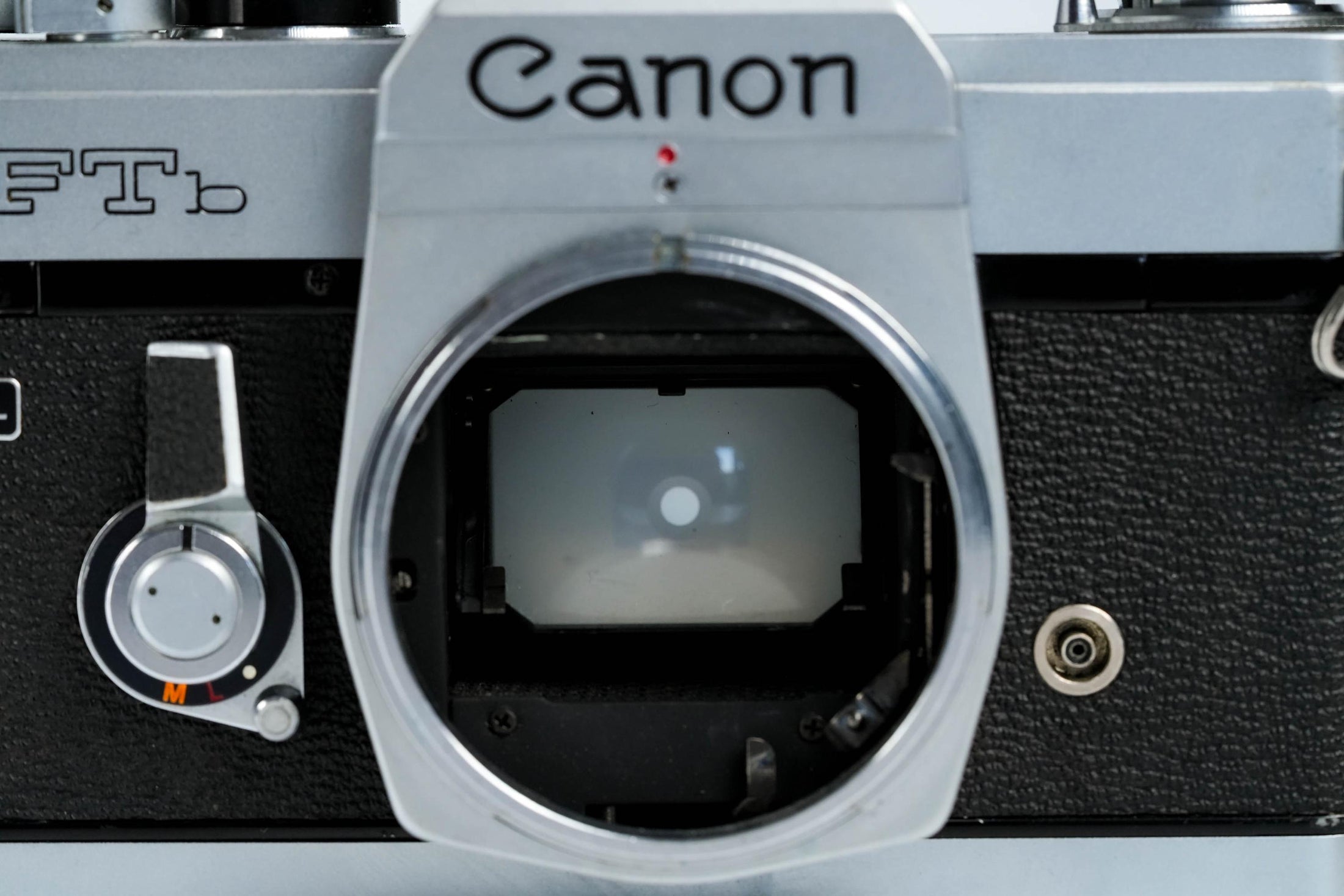 Canon FTb QL + 35-70mm f/3.5-4.5 – Volledig werkend + gratis 35mm film