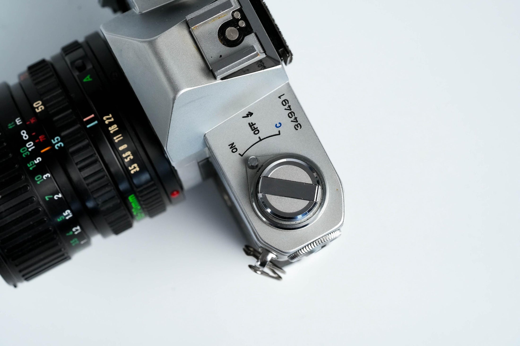 Canon FTb QL + 35-70mm f/3.5-4.5 – Volledig werkend + gratis 35mm film