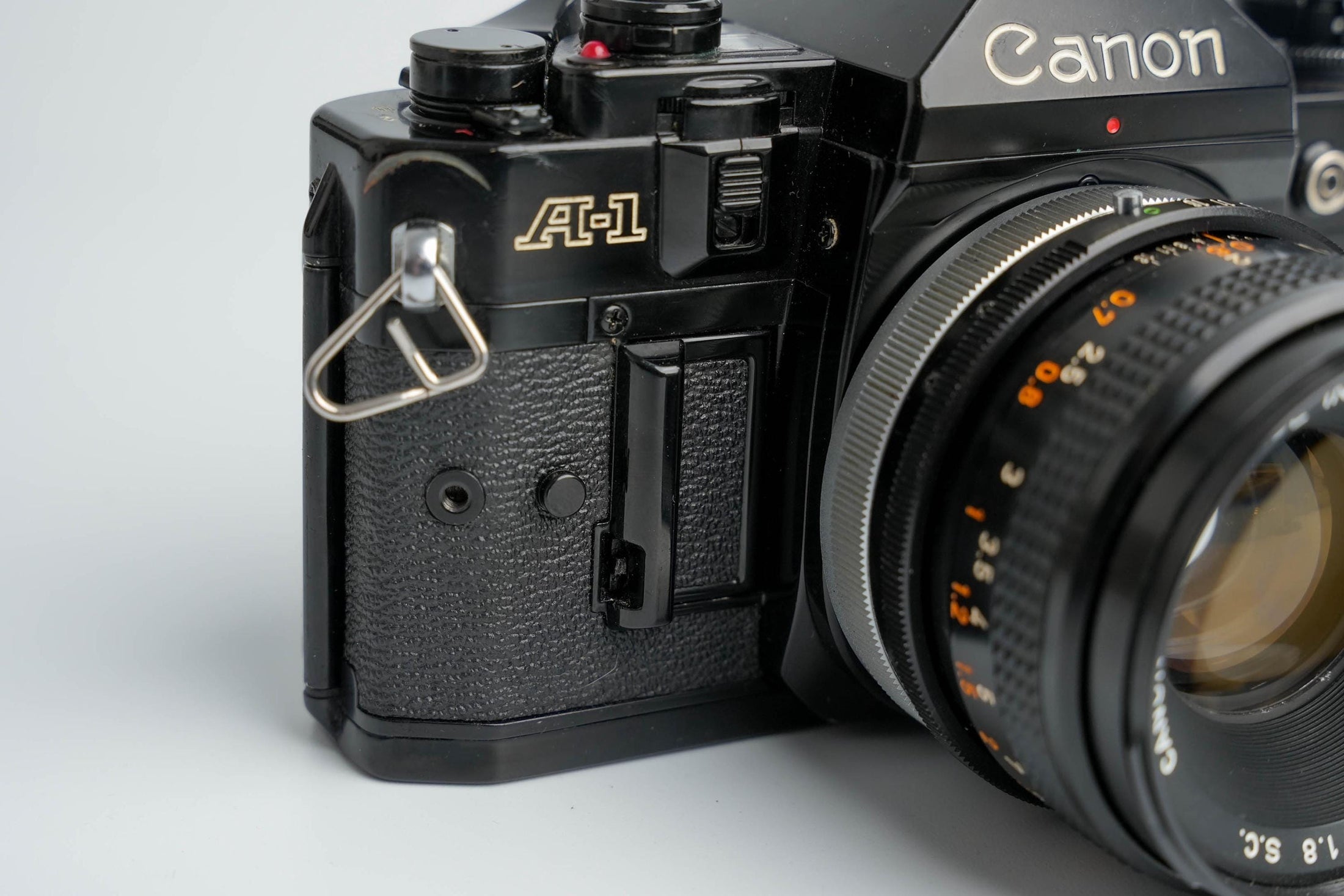 Canon A-1 Zwart – Vintage 35mm SLR met Canon FD 50mm f/1.8 Lens – Getest en Werkend