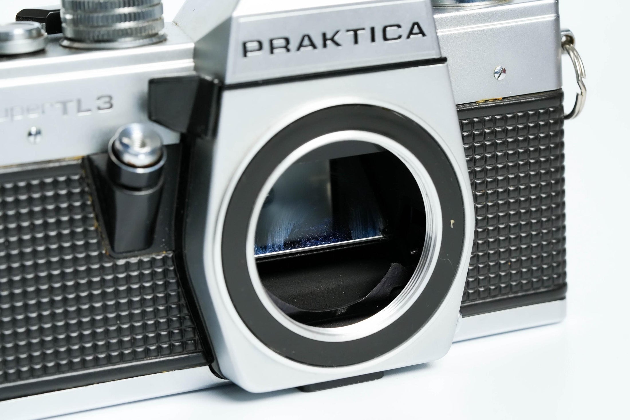 Praktica Super TL 3 + Pentacon 50mm f/1.8 – Klassieke SLR met gratis 35mm film