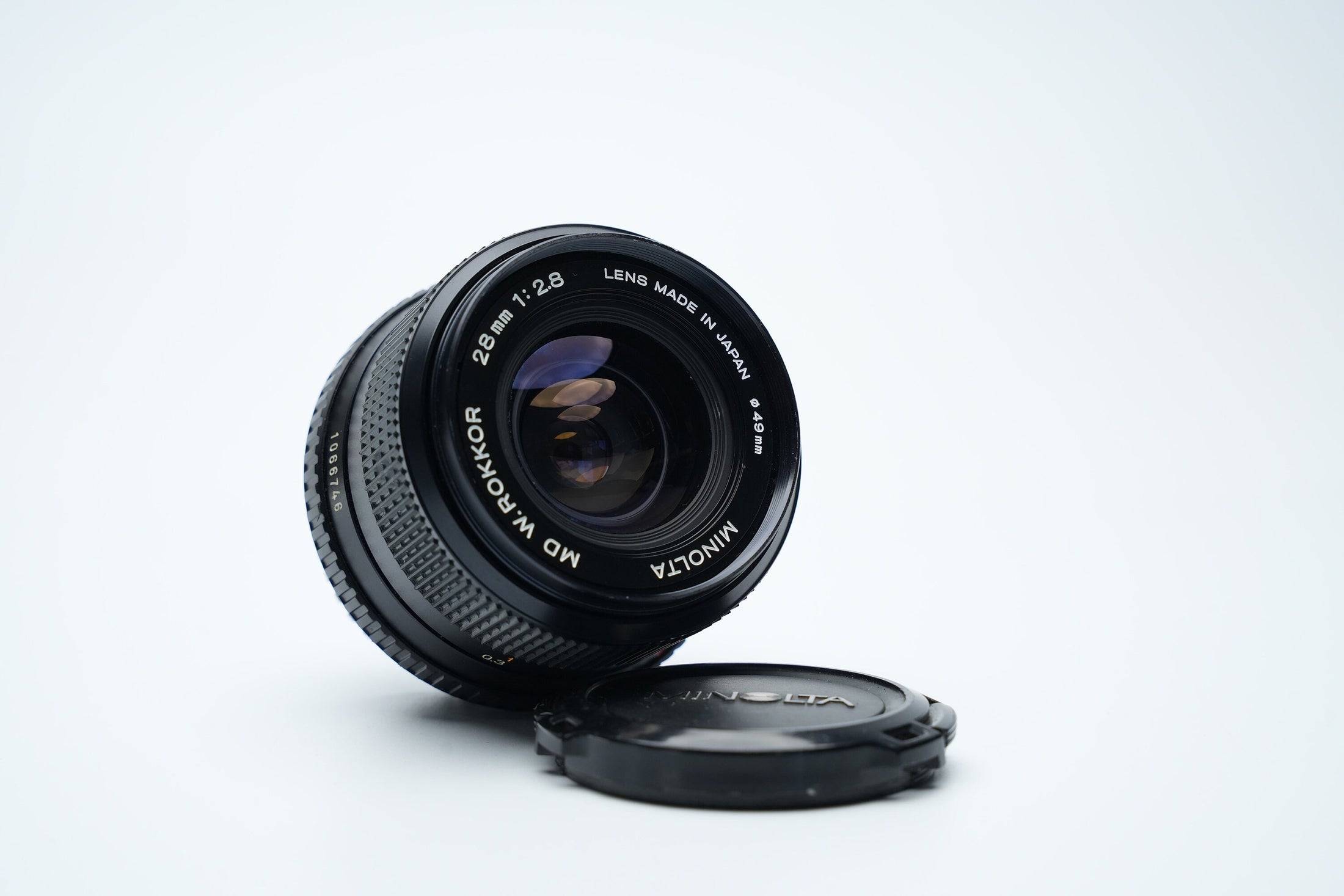 Minolta MD W.Rokkor 28mm f/2.8 Vintage Groothoeklens – Ideaal voor Landschaps- en Straatfotografie