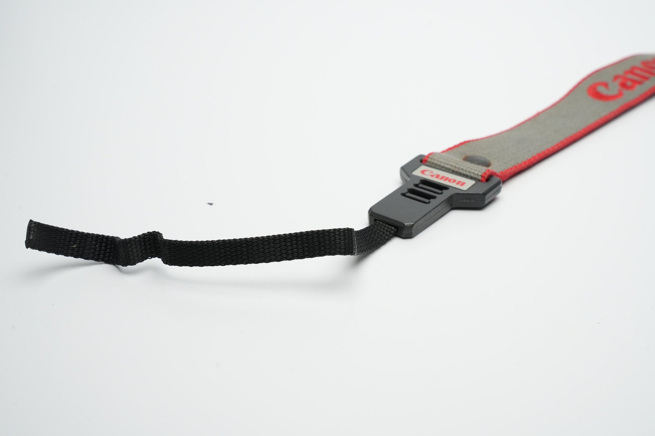 Vintage Canon cameraband grijs met rood | Vintage cameraband | Canon jaren 80