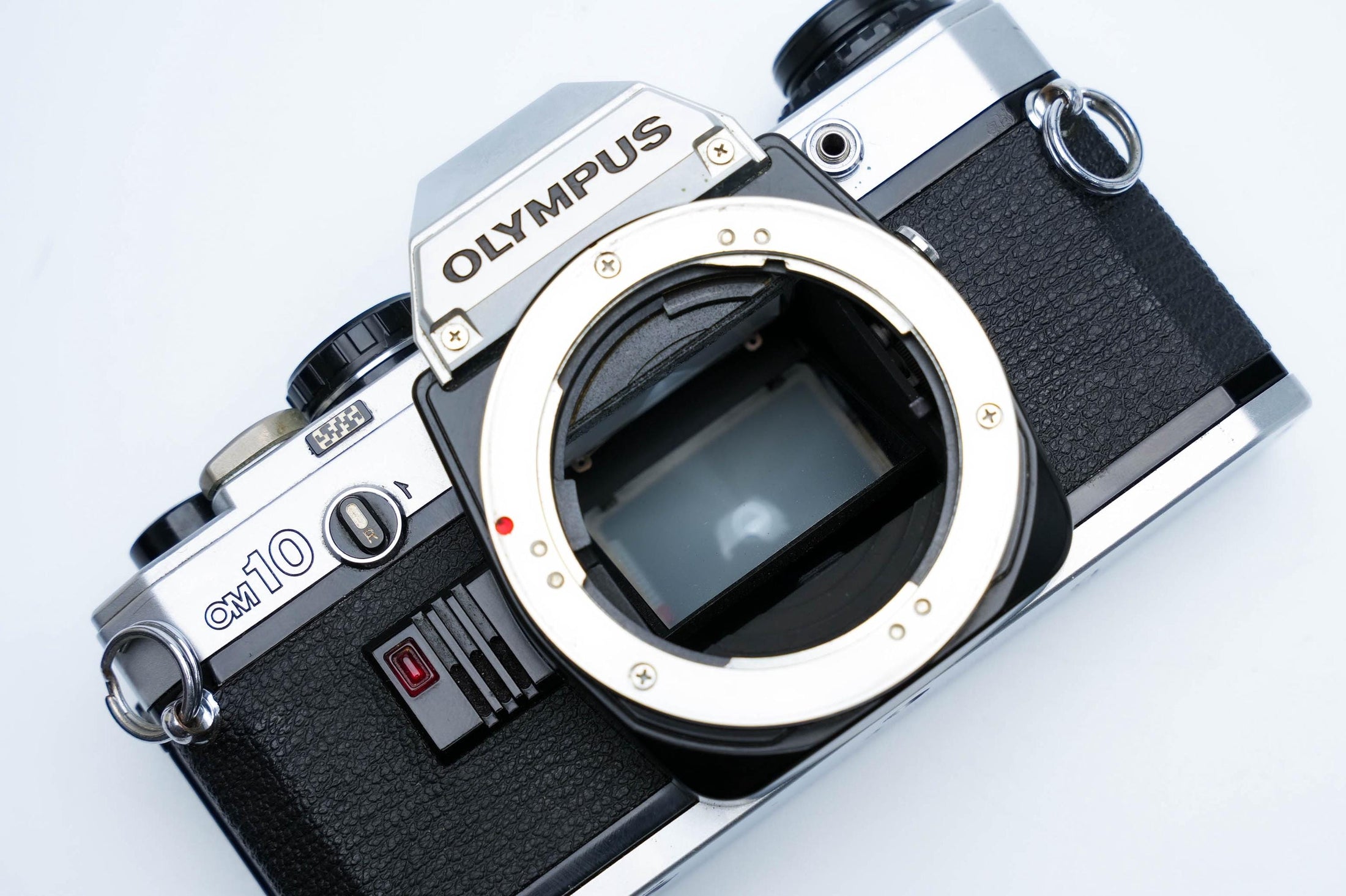 Olympus OM-10 + OM-System G.Zuiko 28mm f/3.5 + Gratis Kodak Gold 35mm