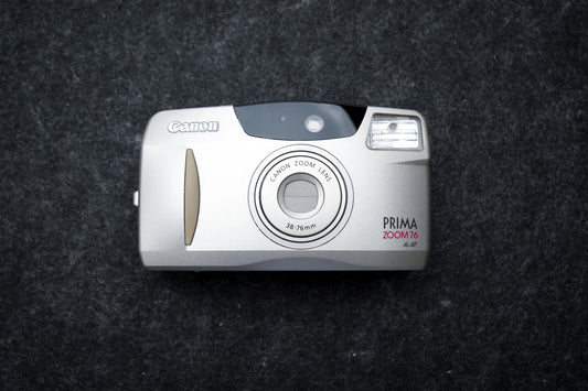 Canon Prima Zoom 76 + gratis 35mm film – 35mm point-and-shoot camera – 1999 – nieuw in doos, old stock by Unseend