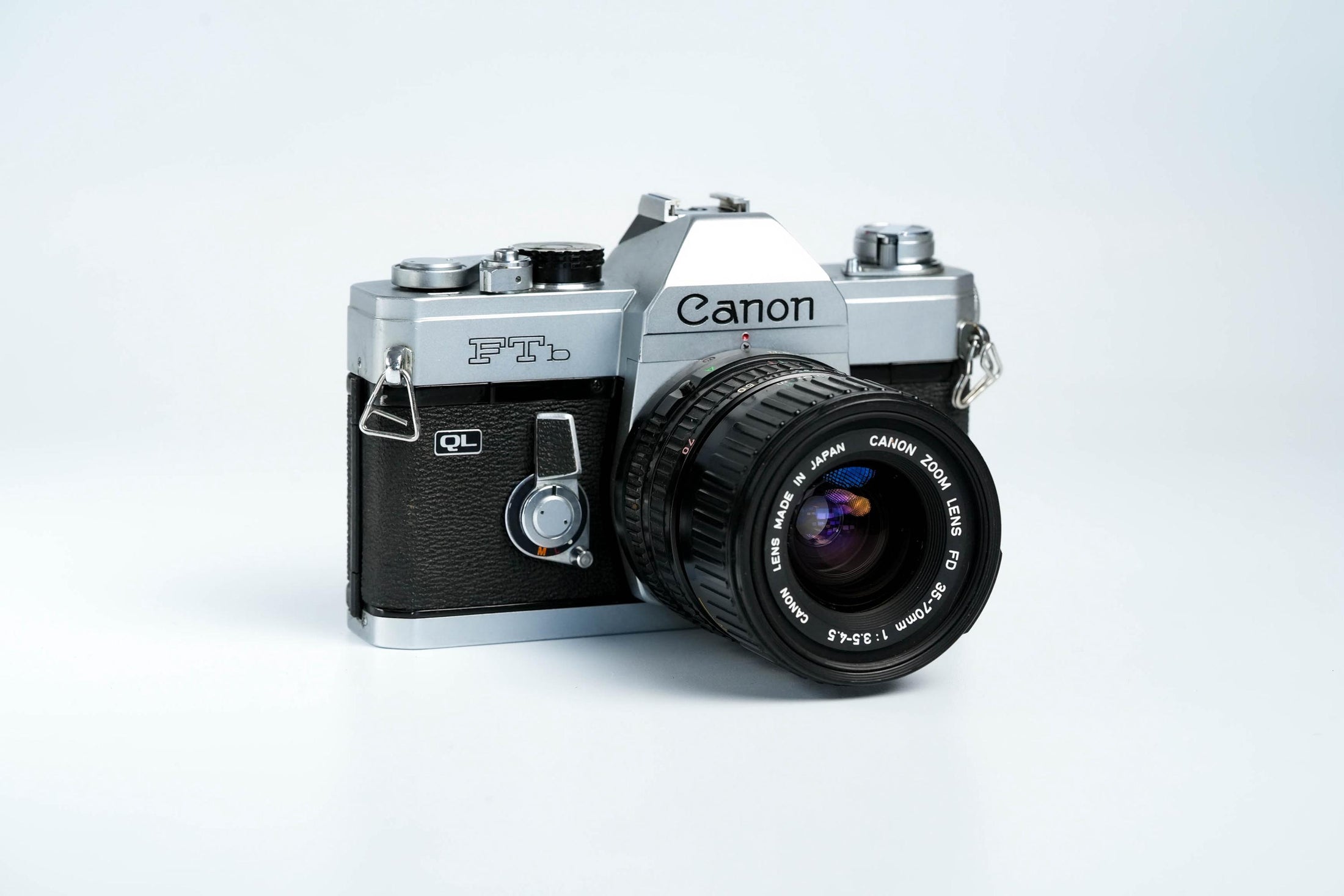 Canon FTb QL + 35-70mm f/3.5-4.5 – Volledig werkend + gratis 35mm film