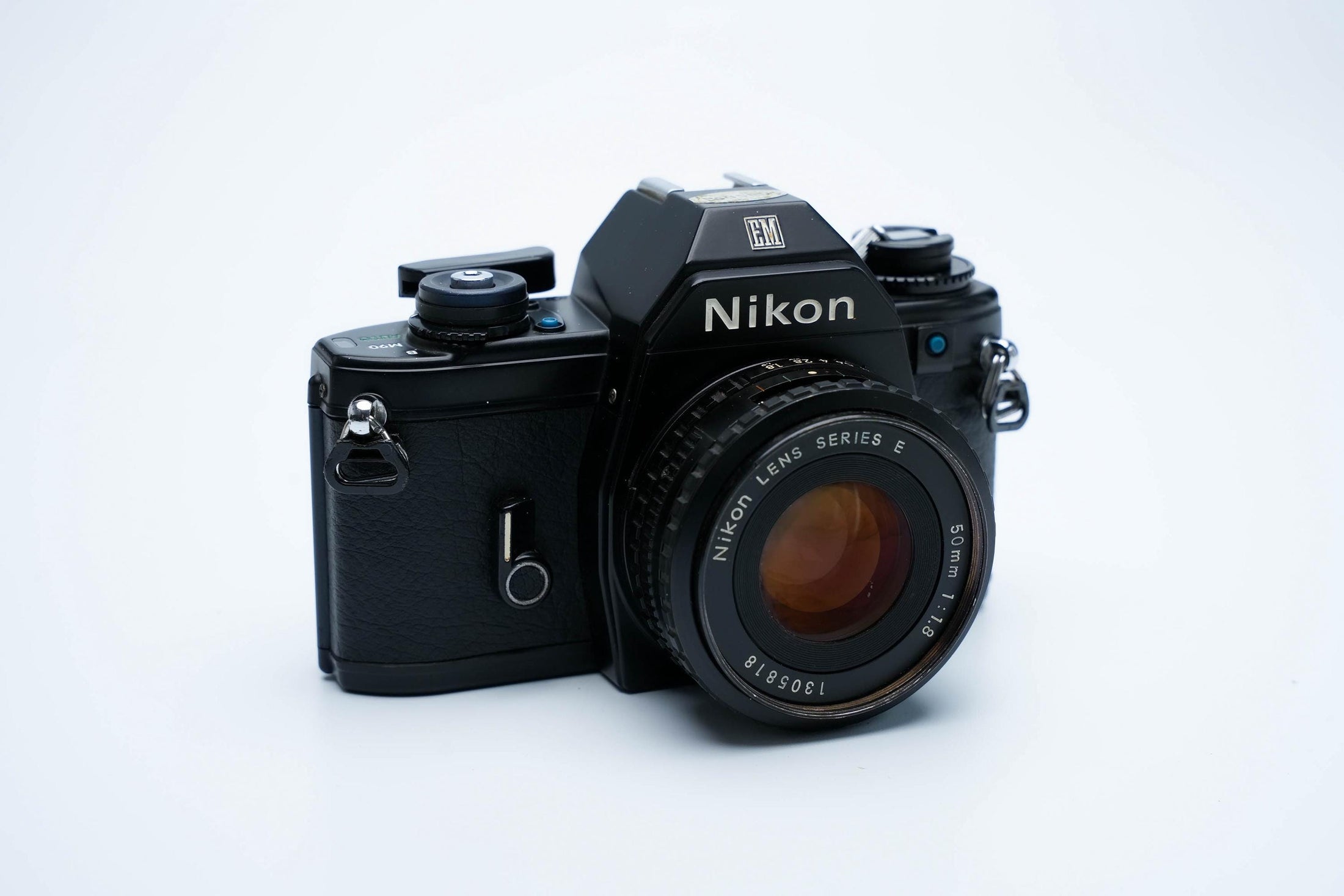Nikon EM –  Nikon Series E 50mm f/1.8 + Gratis Kodak Gold 35mm Film