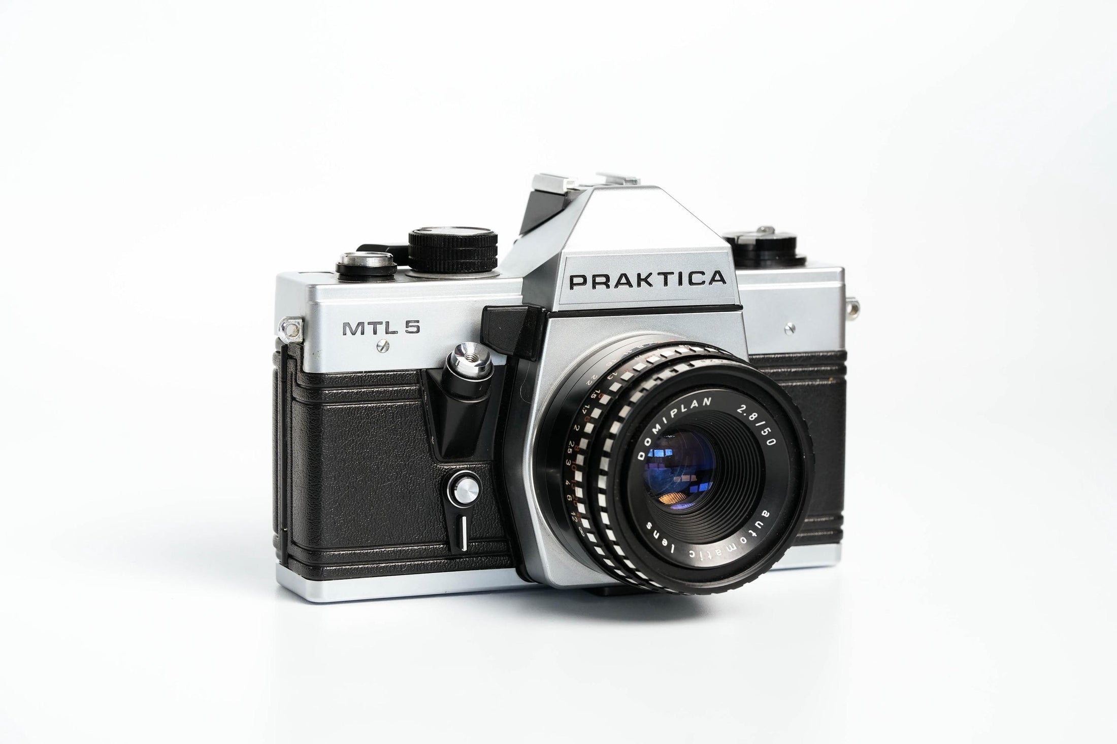 Praktica MTL 5 + Domiplan 50mm f/2.8 + gratis 35mm film – Betrouwbare vintage SLR