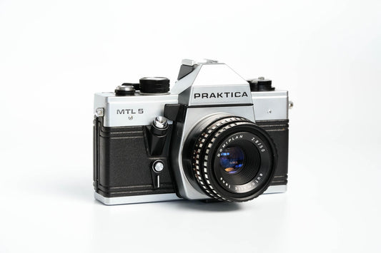 Praktica MTL 5 + Domiplan 50mm f/2.8 + gratis 35mm film – Betrouwbare vintage SLR