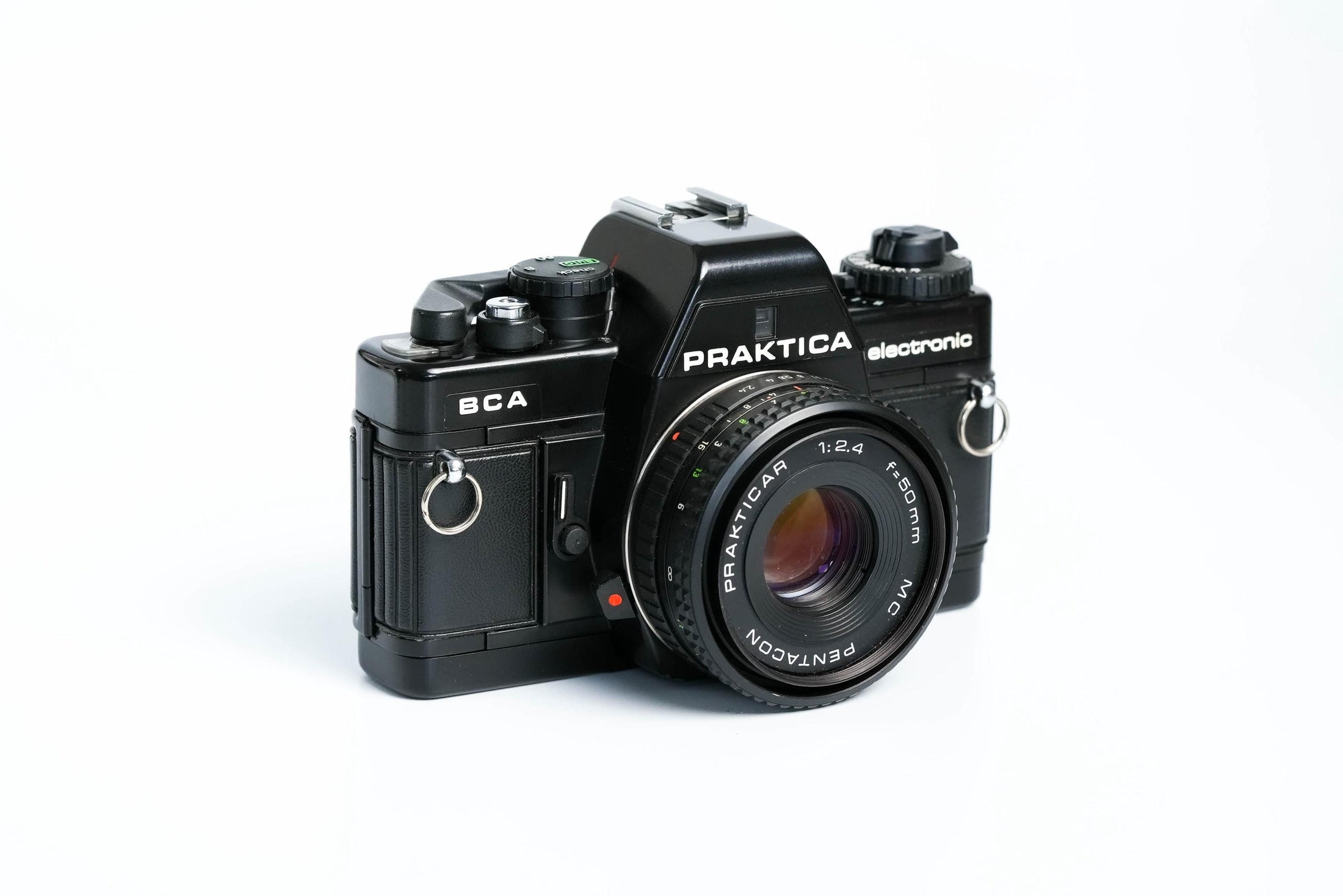 Praktica BCA + Prakticar 50mm f/2.4 + gratis 35mm film – Elektronische vintage SLR