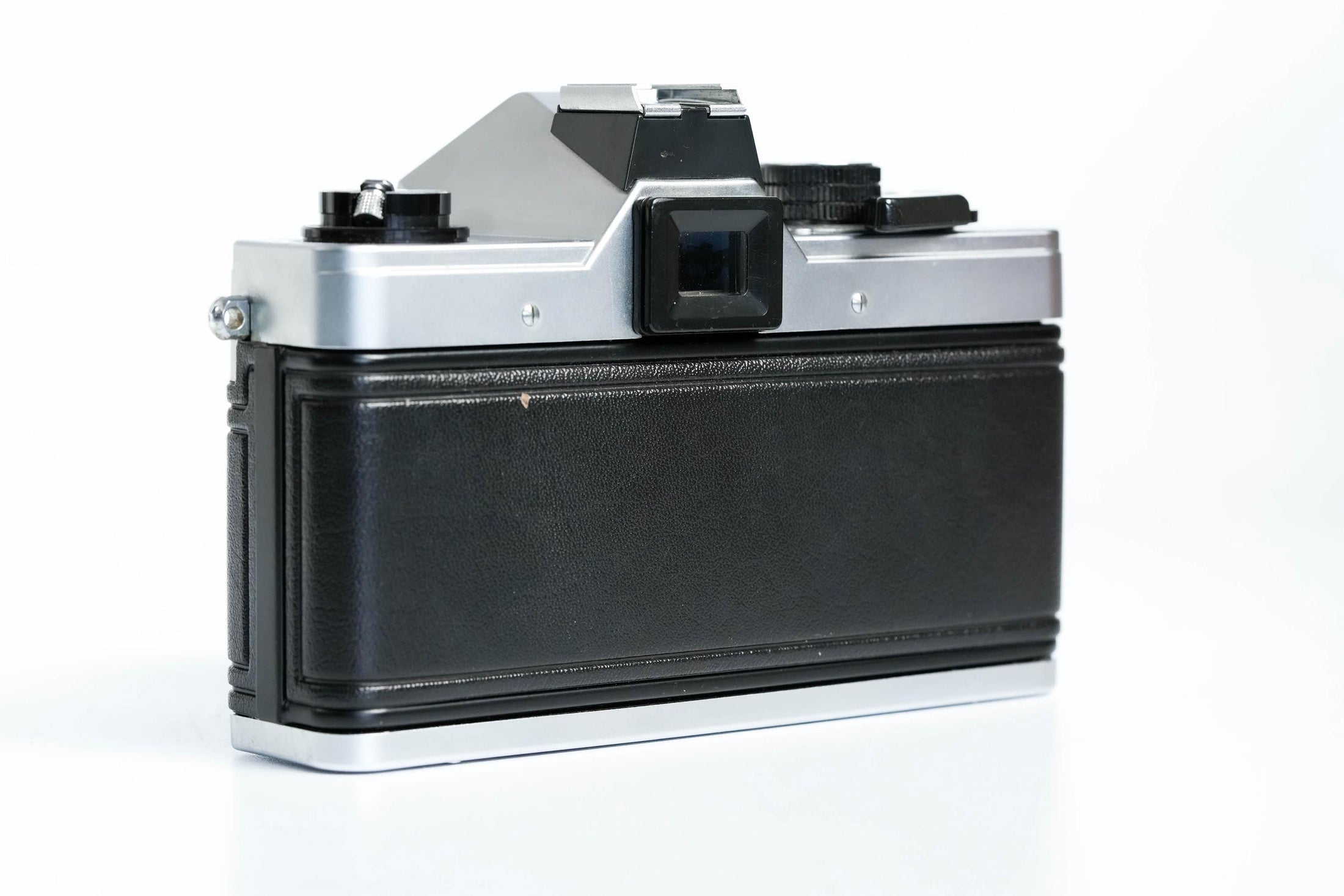 Praktica MTL 5 + Domiplan 50mm f/2.8 + gratis 35mm film – Betrouwbare vintage SLR