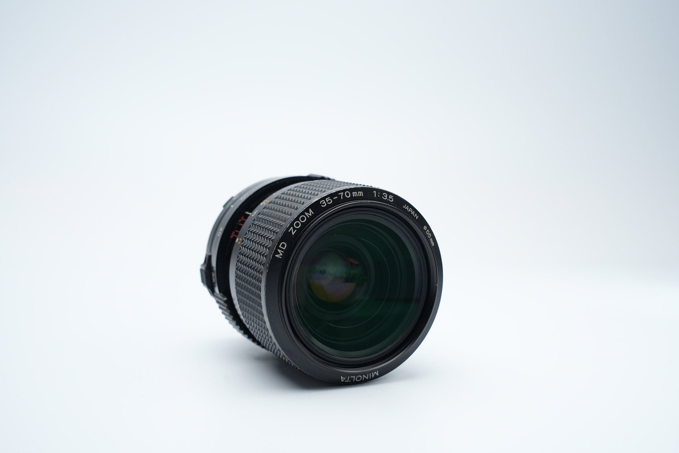 Minolta MD 35-70mm f/3.5 Macro Zoom Lens met Zonnekap