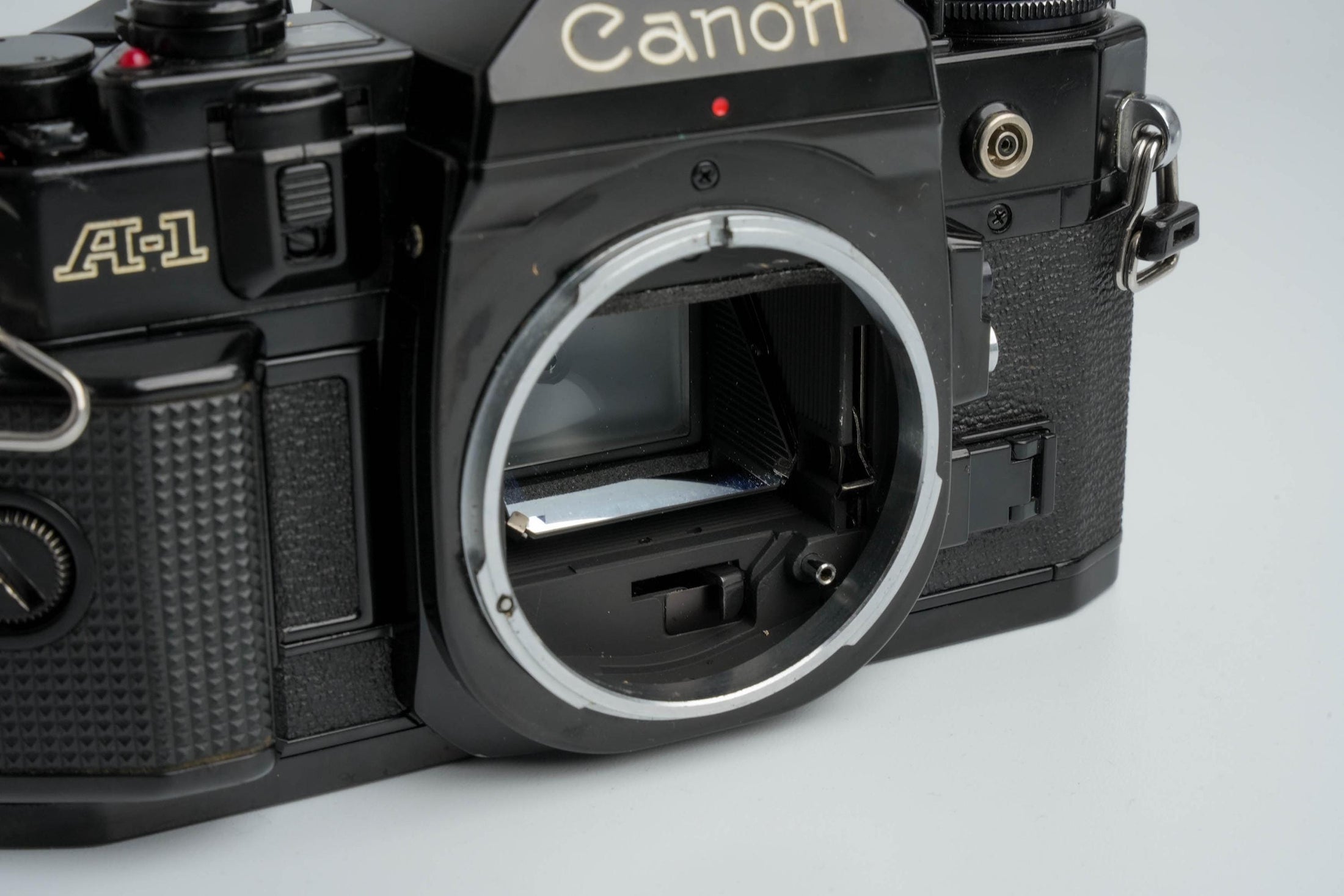 Canon A-1 Zwart – Vintage 35mm SLR met Canon FD 50mm f/1.8 Lens – Getest en Werkend