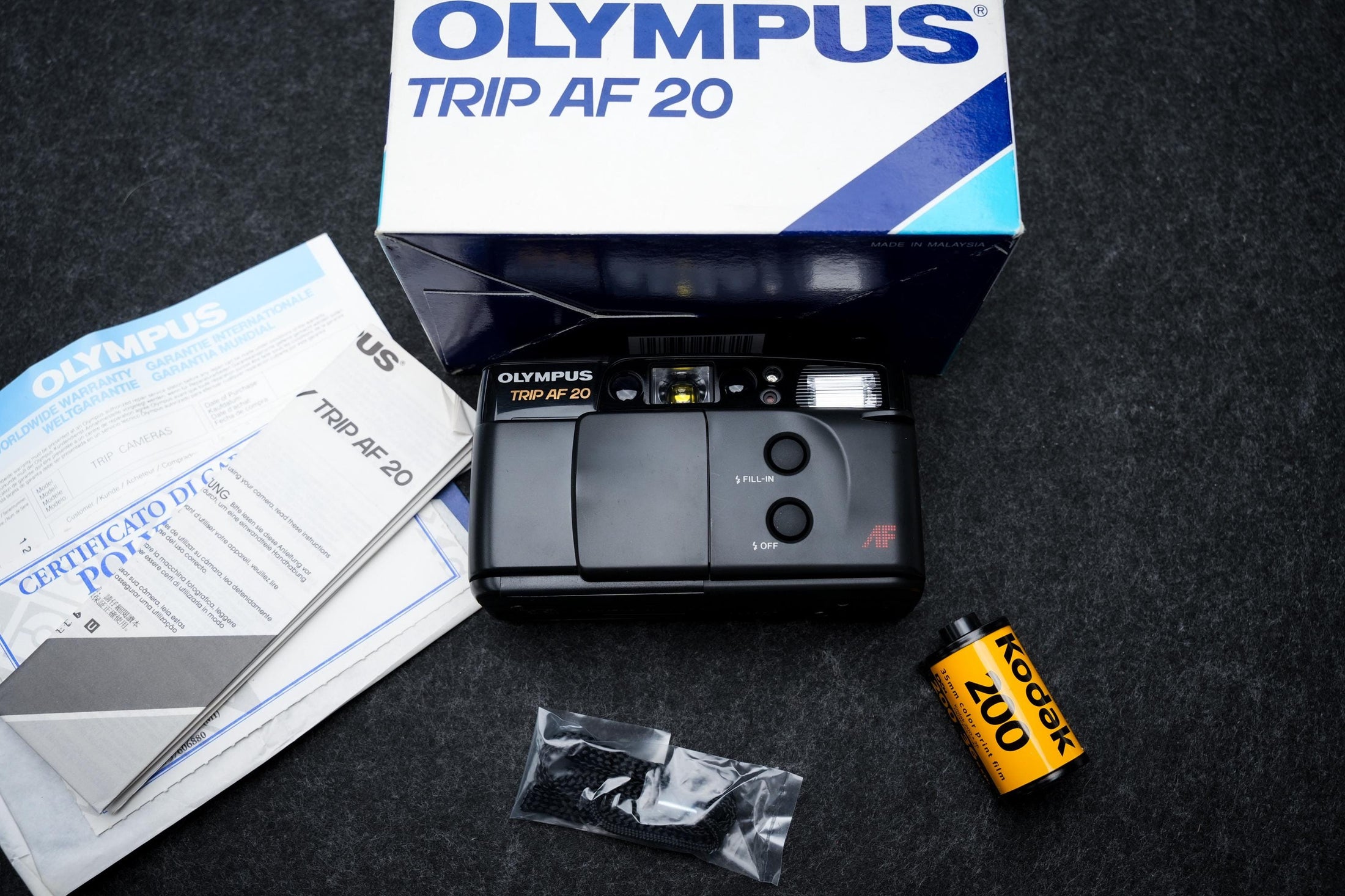 Olympus Trip AF 20 + gratis 35mm film – 35mm compact camera – 1995 – nieuw in doos, old stock, getest