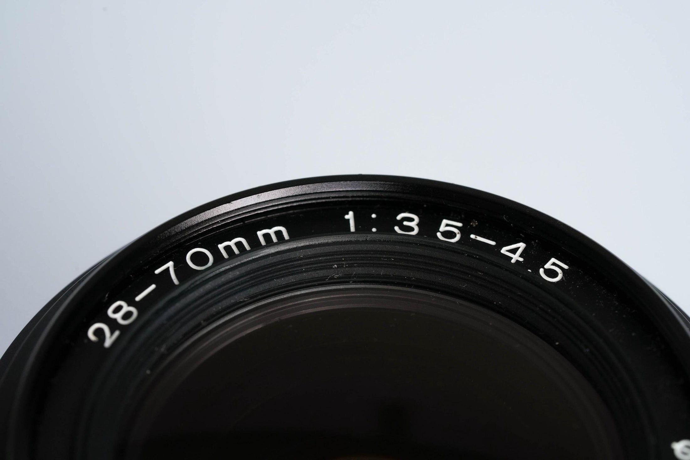 Tokina 28-70mm f3.5-4.5 (Minolta MD) – Veelzijdige Vintage Zoomlens
