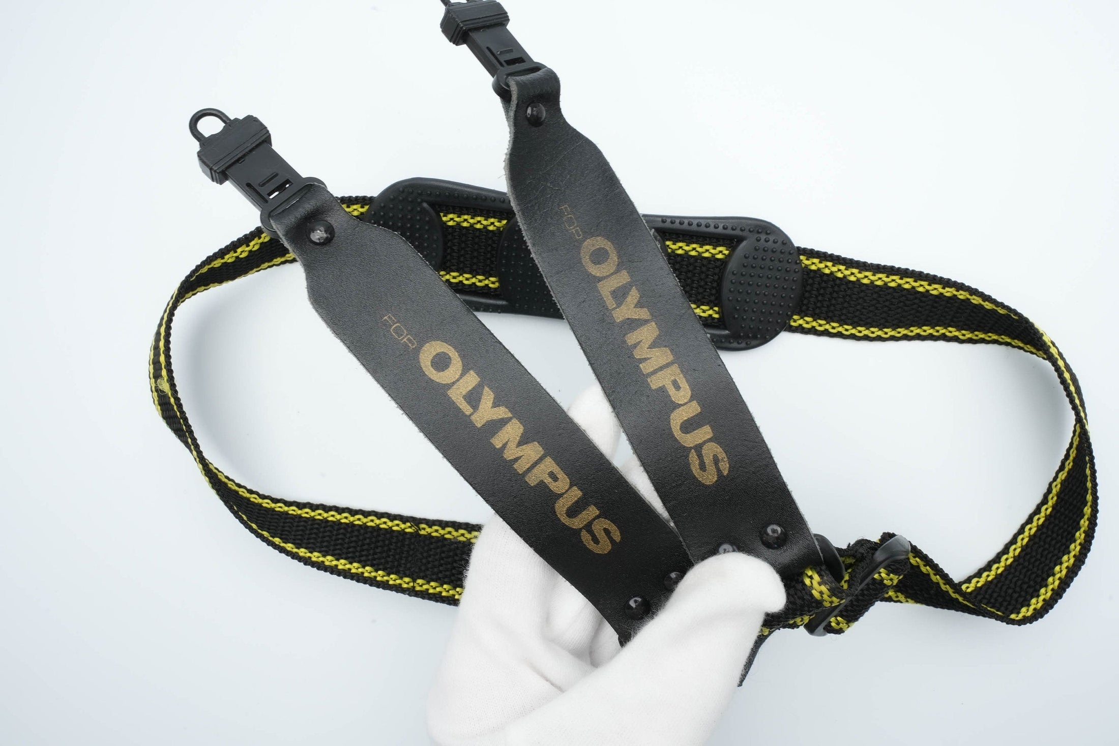 Olympus vintage strap in de kleur geel en zwart (camera riem)