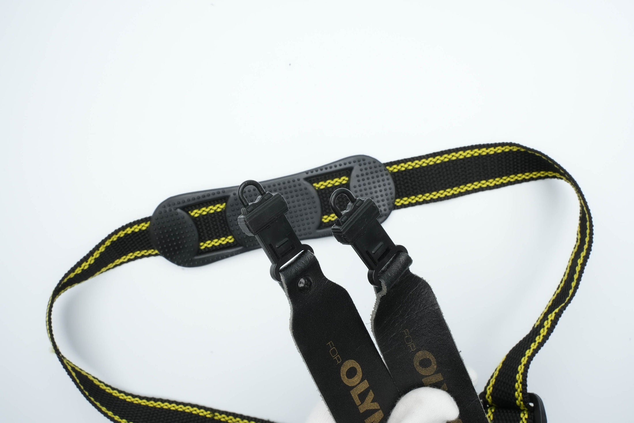 Olympus vintage strap in de kleur geel en zwart (camera riem)